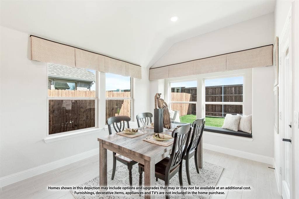 942 Cardinal Drive, Midlothian, TX 76065 Vaulted ceiling, recessed lighting, expansive windows, window seat, and light-toned wood-finish flooring