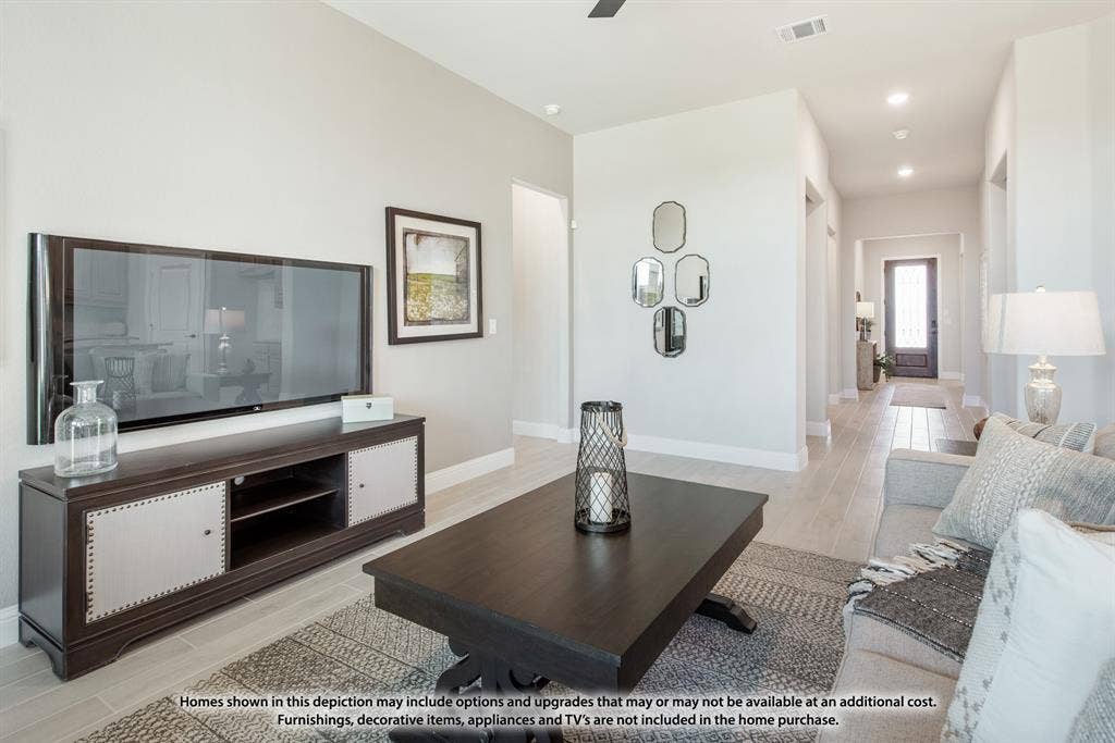 942 Cardinal Drive, Midlothian, TX 76065 Vaulted ceiling, recessed lighting, wood-finish flooring, and a paneled entry door with frosted glass insert