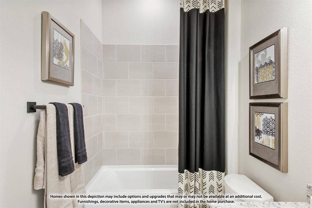 942 Cardinal Drive, Midlothian, TX 76065 Bathtub with subway tile surround and matte black towel bar