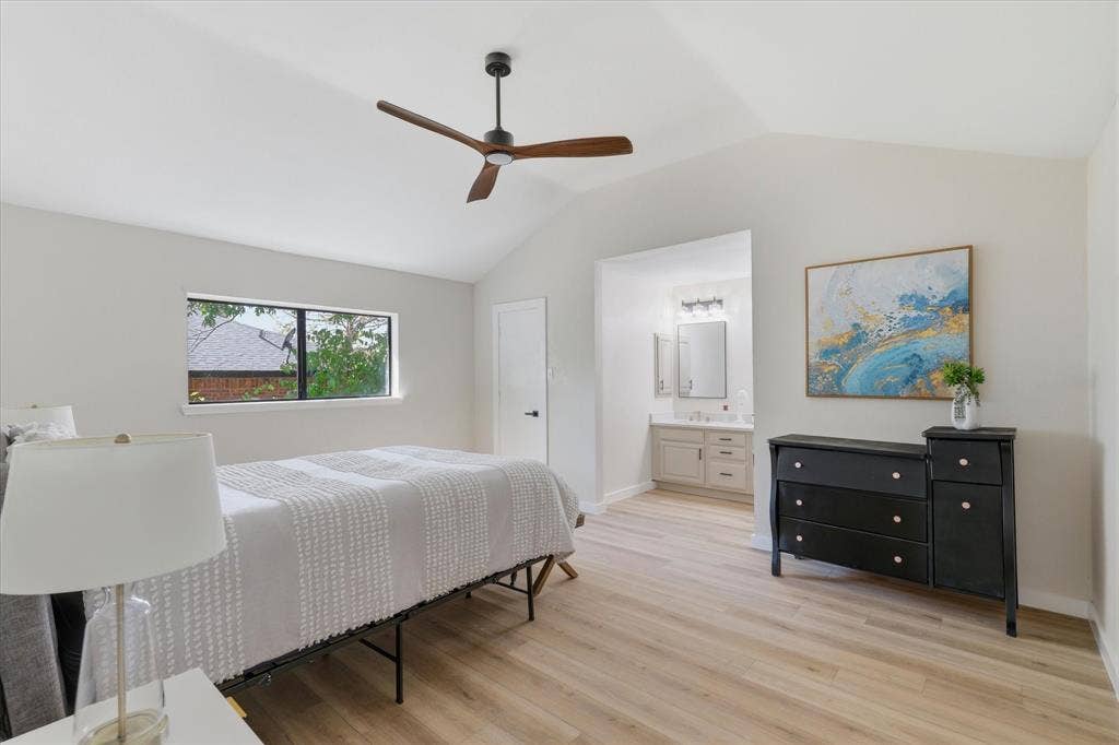 3405 Mill Ridge, Bedford, TX 76021 Vaulted ceilings with a ceiling fan, recessed window, wood-finish flooring, and an en-suite vanity with a single sink