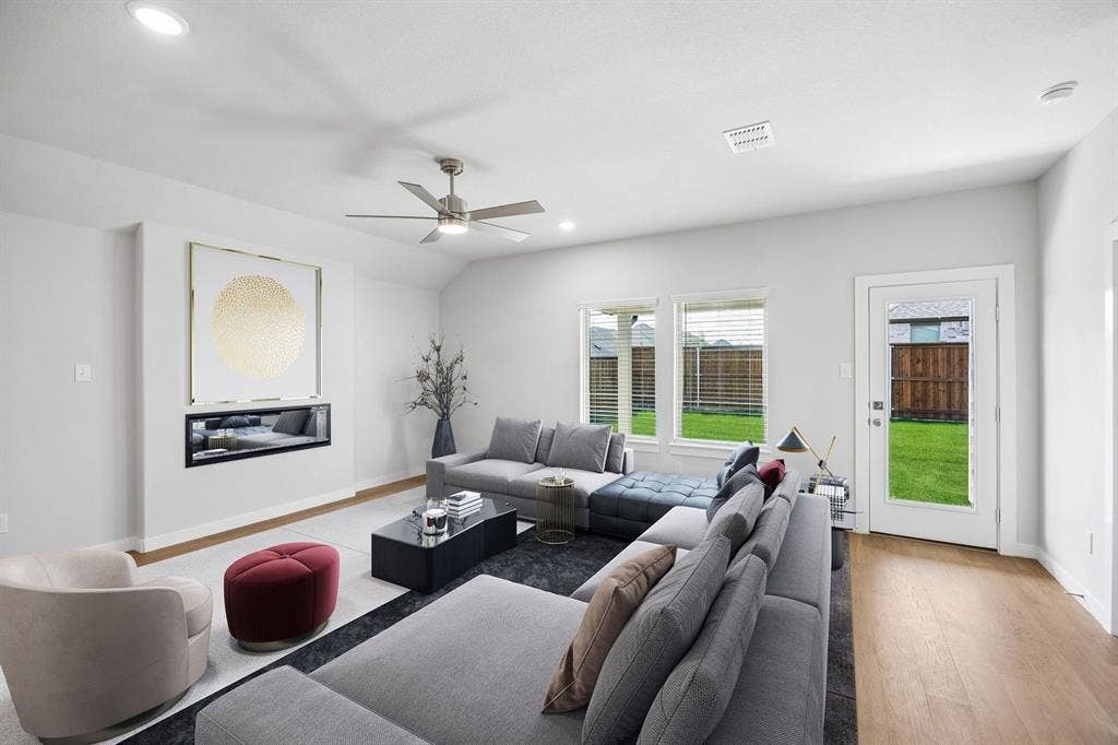 1401 Companero Street, Haslet, TX 76052 Living Room in the Oscar home plan by Trophy Signature Homes – REPRESENTATIVE PHOTO