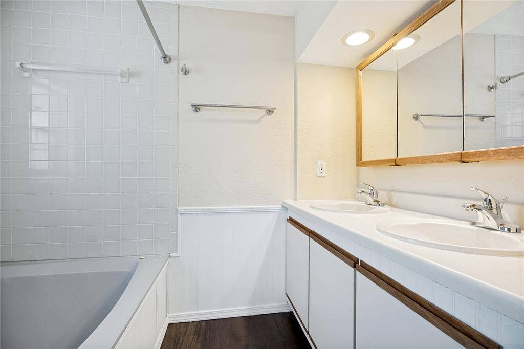 2406 County Road 852, McKinney, TX 75071 Dual basin vanity with white cabinetry and wood-finish pulls