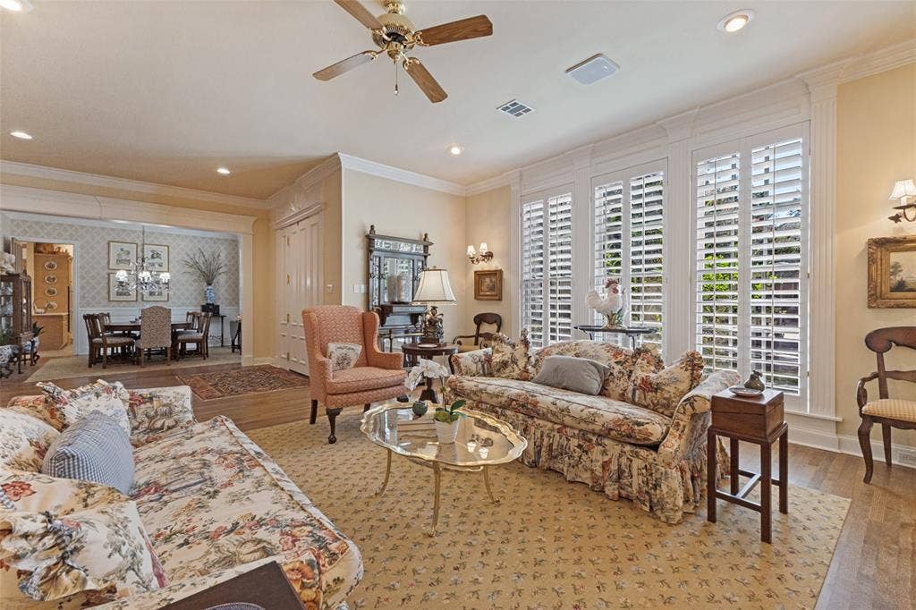 12012 Excelsior Way, Dallas, TX 75230 Recessed ceiling lighting, wood-finish flooring, ceiling fan, crown molding, and plantation shutters