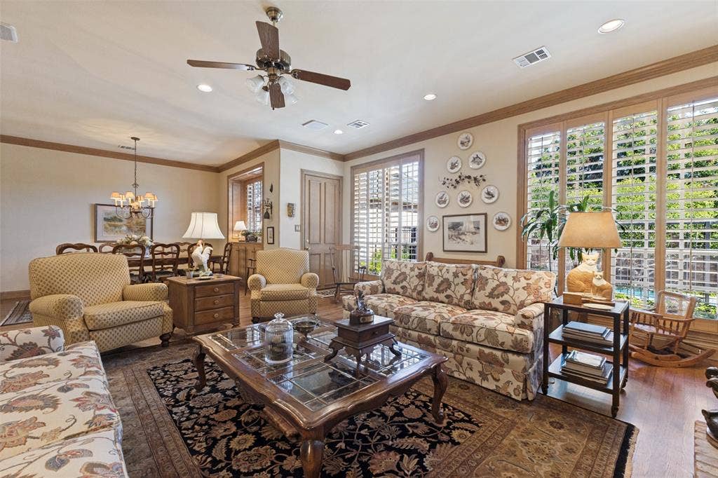 12012 Excelsior Way, Dallas, TX 75230 Recessed lighting and ceiling fan, wood-finish flooring, plantation shutters, and crown molding