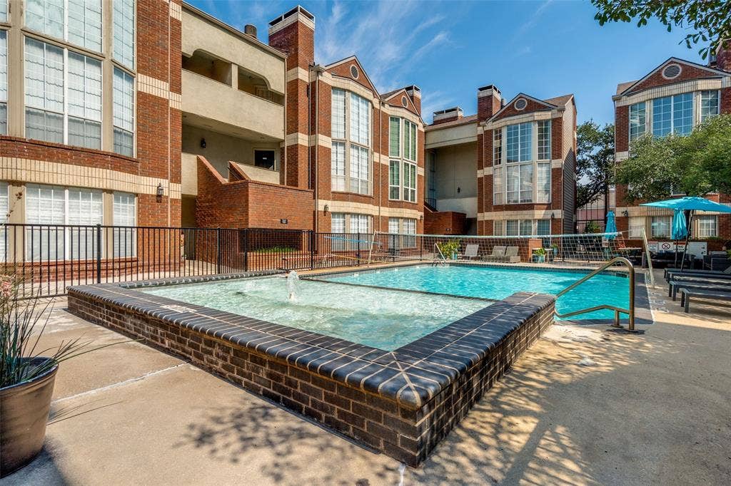 3100 Cole Avenue, #213, Dallas, TX 75204 Community pool with a patio