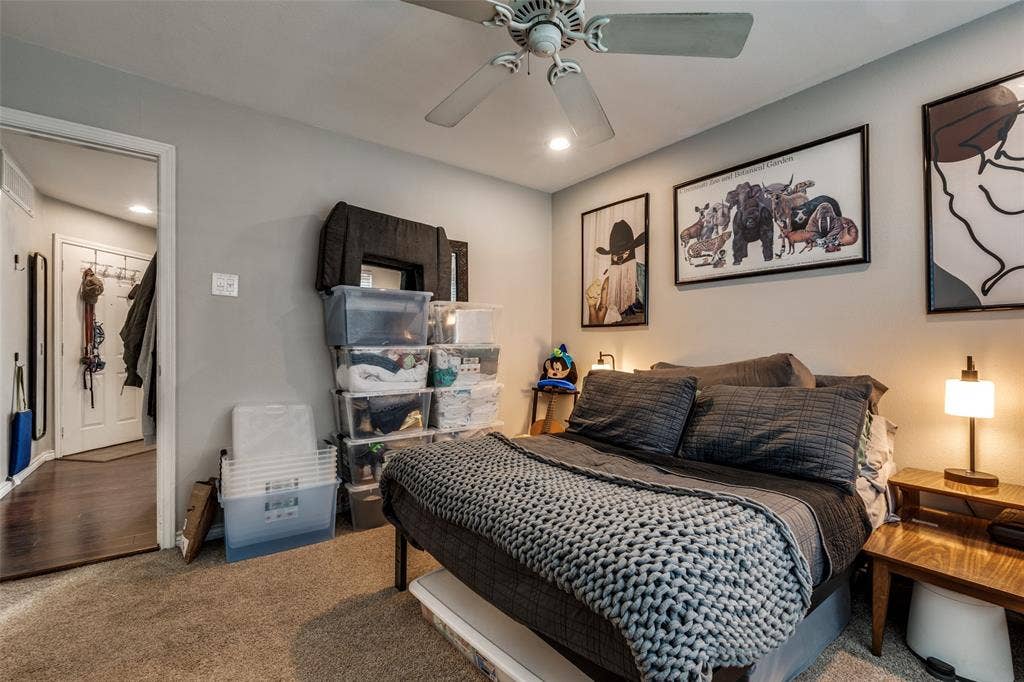 3100 Cole Avenue, #213, Dallas, TX 75204 Bedroom with carpet flooring, a ceiling fan, and recessed lighting