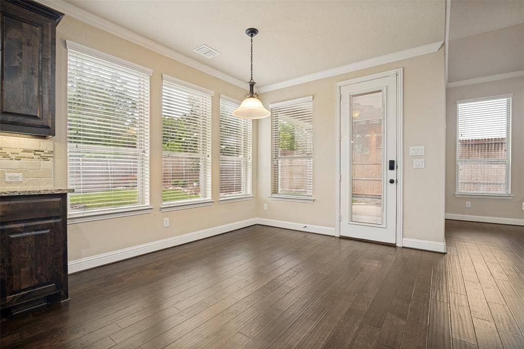 10002 Edgeway Circle, Rowlett, TX 75089 Breakfast area with access to patio and backyard.