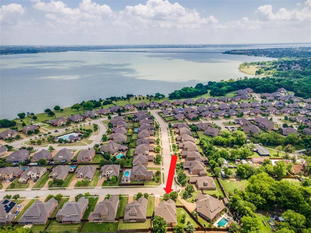 10002 Edgeway Circle, Rowlett, TX 75089 Aerial view of Waters Edge neighborhood showing Lake Ray Hubbard in background.