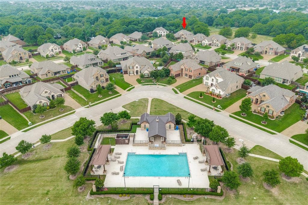 10002 Edgeway Circle, Rowlett, TX 75089 Aerial view of Waters Edge neighborhood showing pool area.