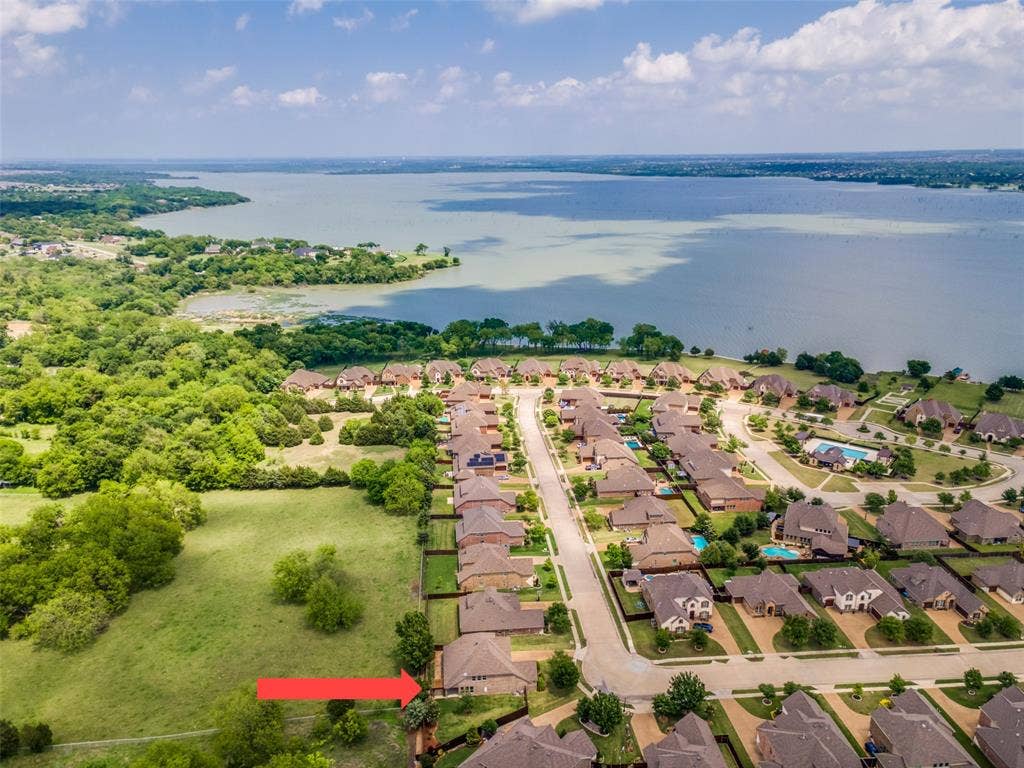 10002 Edgeway Circle, Rowlett, TX 75089 Aerial view of Waters Edge neighborhood showing Lake Ray Hubbard in background.