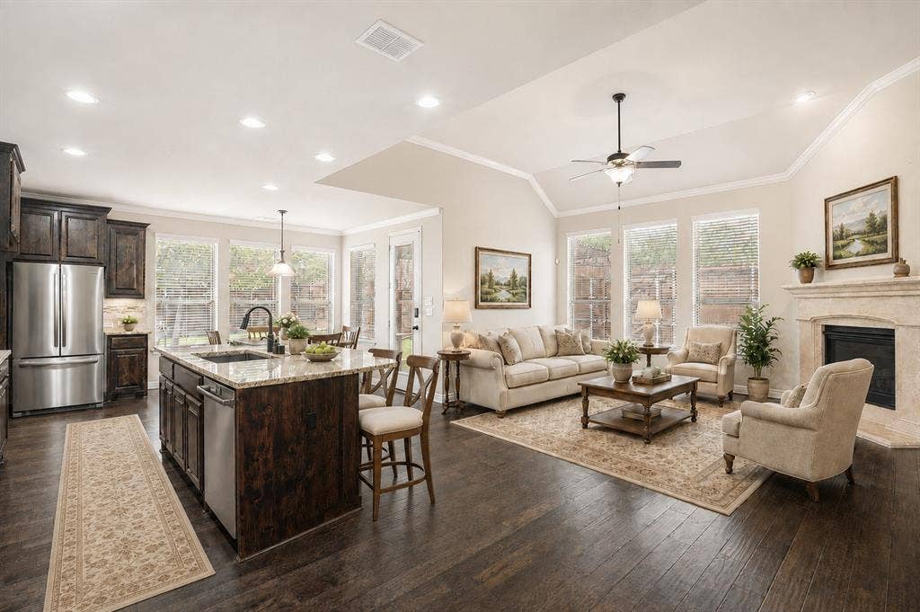 10002 Edgeway Circle, Rowlett, TX 75089 Open plan living area, kitchen, and breakfast area (virtually staged).
