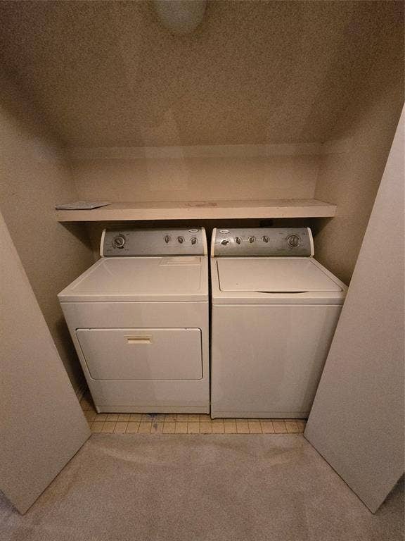 2127 Cordoba Drive, Carrollton, TX 75006 Laundry with washer and dryer