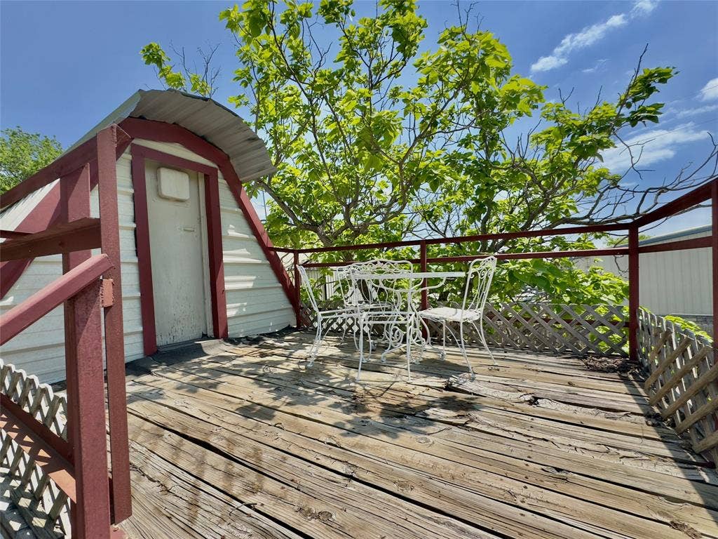 157 Business Boulevard, Granbury, TX 76049 Wooden deck with outdoor dining area