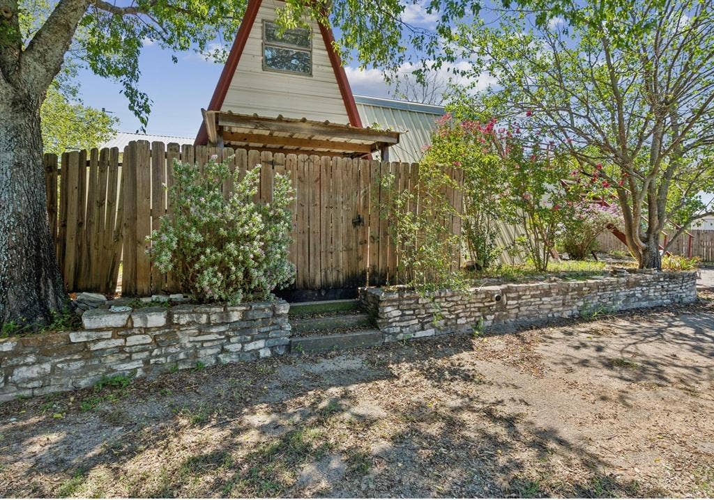 157 Business Boulevard, Granbury, TX 76049 View of yard featuring fence