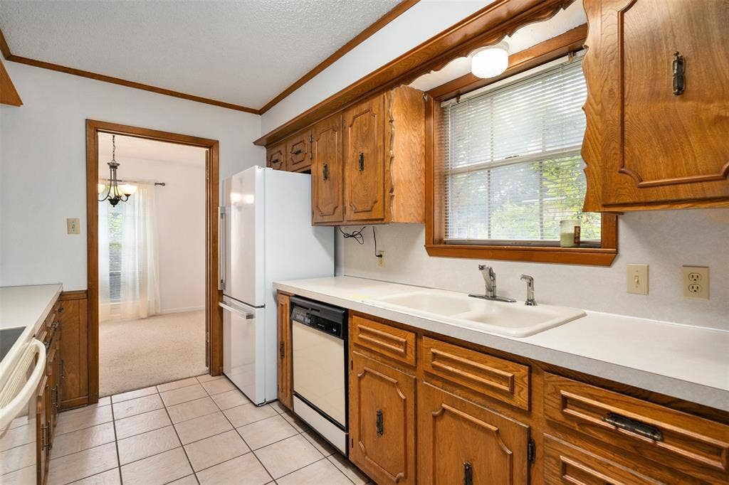 925 Bradley Drive, Athens, TX 75751 Kitchen including dishwasher, refrigerator, range and microwave