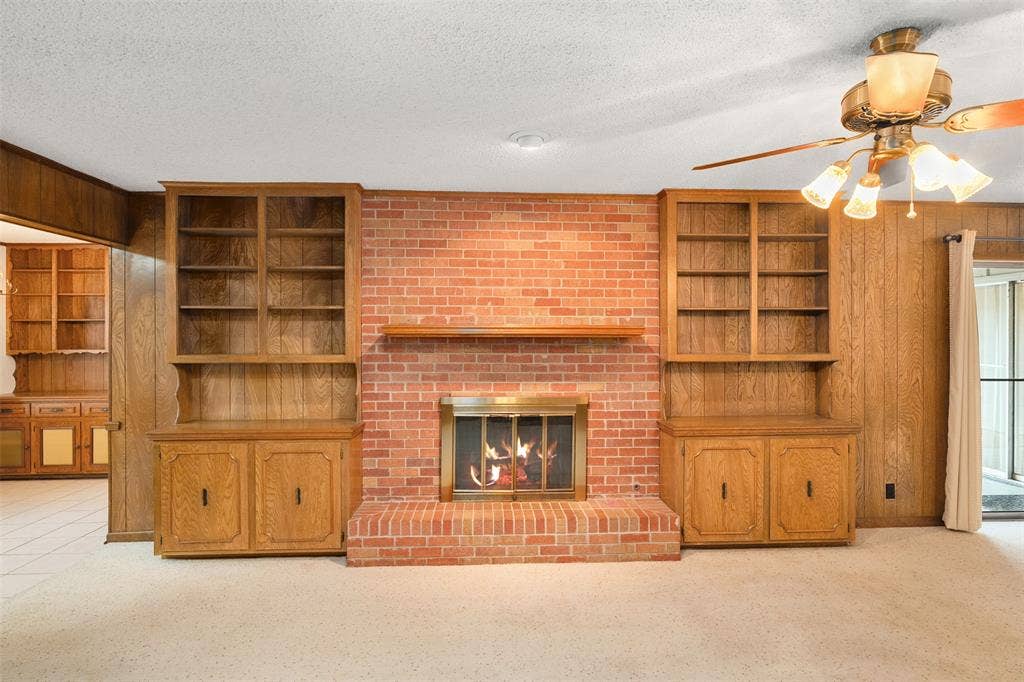 925 Bradley Drive, Athens, TX 75751 Living with wood burning fireplace and built in cabinets