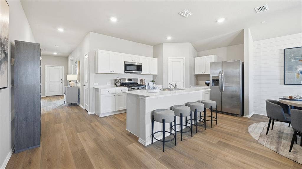 2900 MCCORMICK Street, Denton, TX 76205 Kitchen-All Home and community information, including pricing, included features, terms, availability and amenities, are subject to change at any time without notice or obligation. All Drawings, pictures, photographs, video, square footages, floor plans, elevations, features, colors and sizes are approximate for illustration purposes only and will vary from the homes as built.