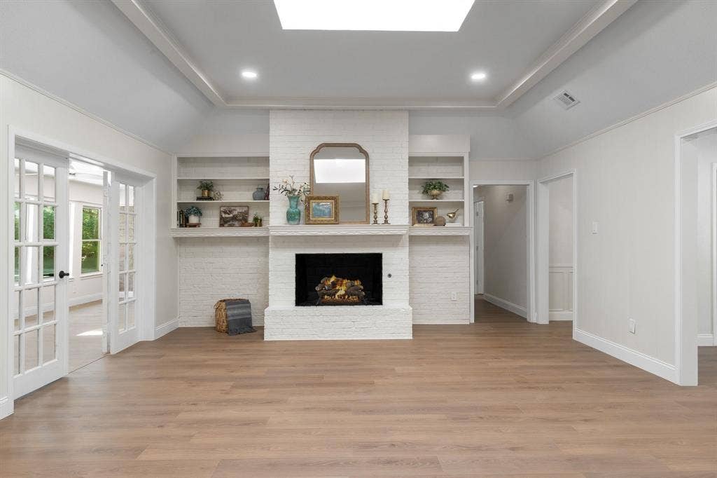 2844 Hurstview Drive, Hurst, TX 76054 Vaulted ceiling, skylight, and fireplace with gas starter