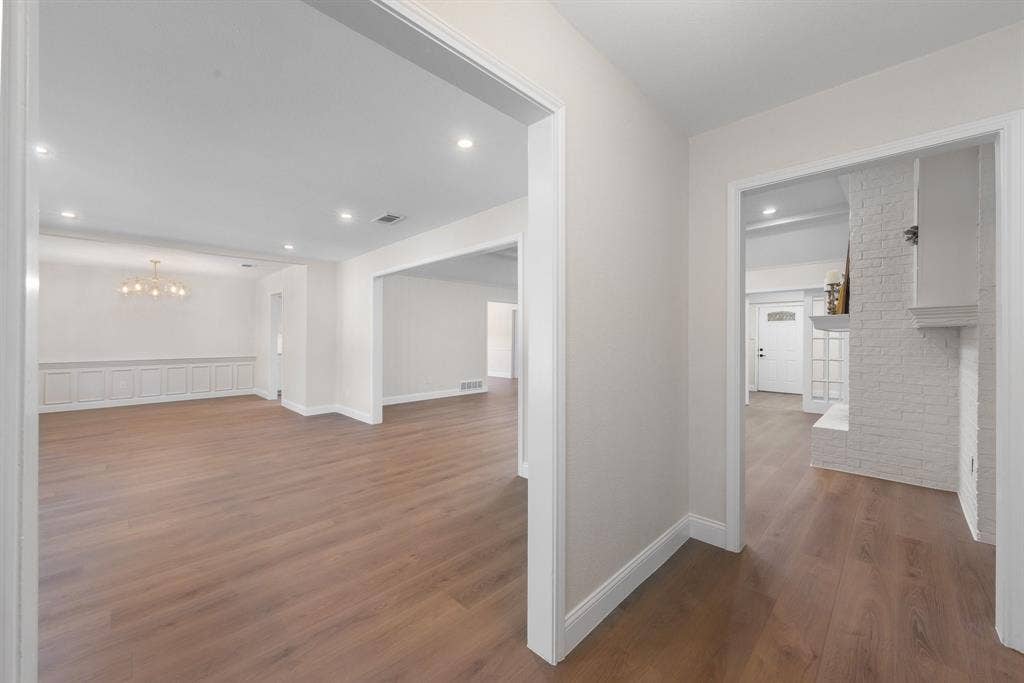 2844 Hurstview Drive, Hurst, TX 76054 Warm new wood-finish flooring and recessed lighting throughout