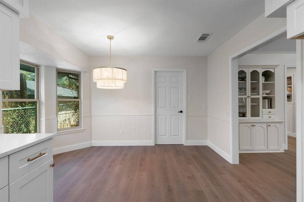 2844 Hurstview Drive, Hurst, TX 76054 Breakfast nook with tiered drum pendant light