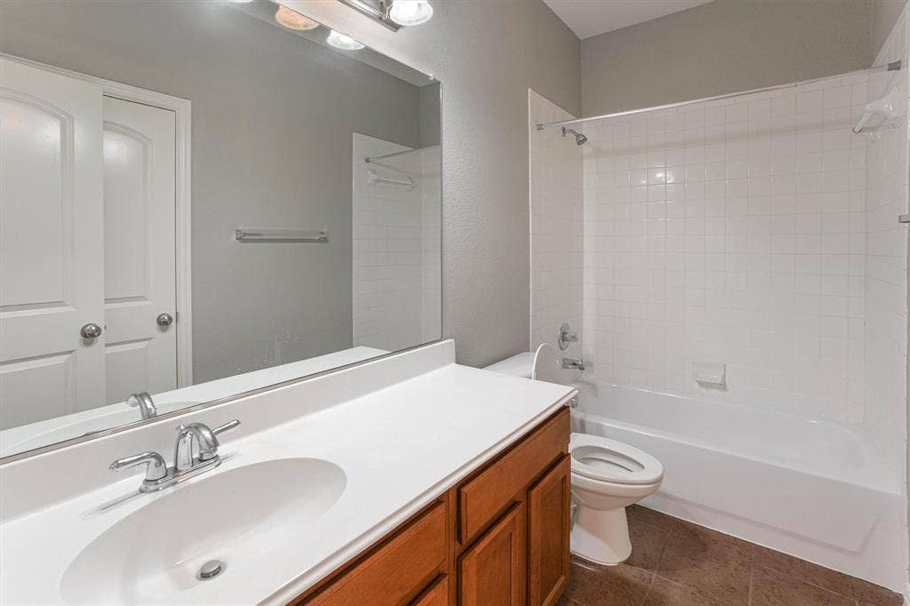 1441 Fox Run Drive, Irving, TX 75063 Hall bathroom conveniently located near secondary bedrooms