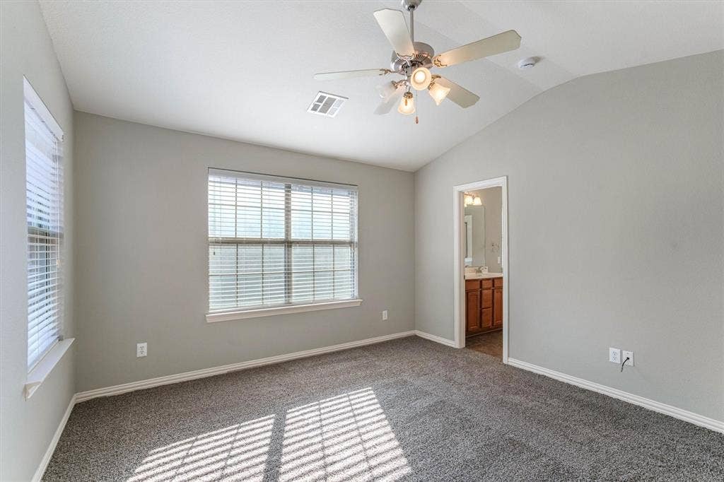 1441 Fox Run Drive, Irving, TX 75063 Fresh carpet, ceiling fan, and ensuite bathroom