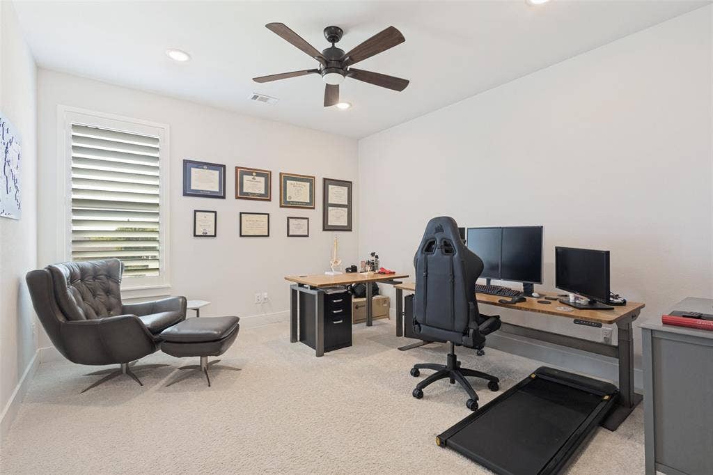 15018 Crape Myrtle Road, Frisco, TX 75035 Recessed lighting, ceiling fan, white walls, carpeted flooring, and a window with plantation shutters