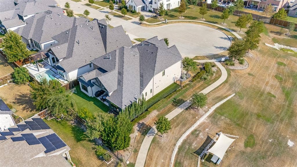15018 Crape Myrtle Road, Frisco, TX 75035 Contemporary residence with a private pool, attached pergola, and manicured lawn