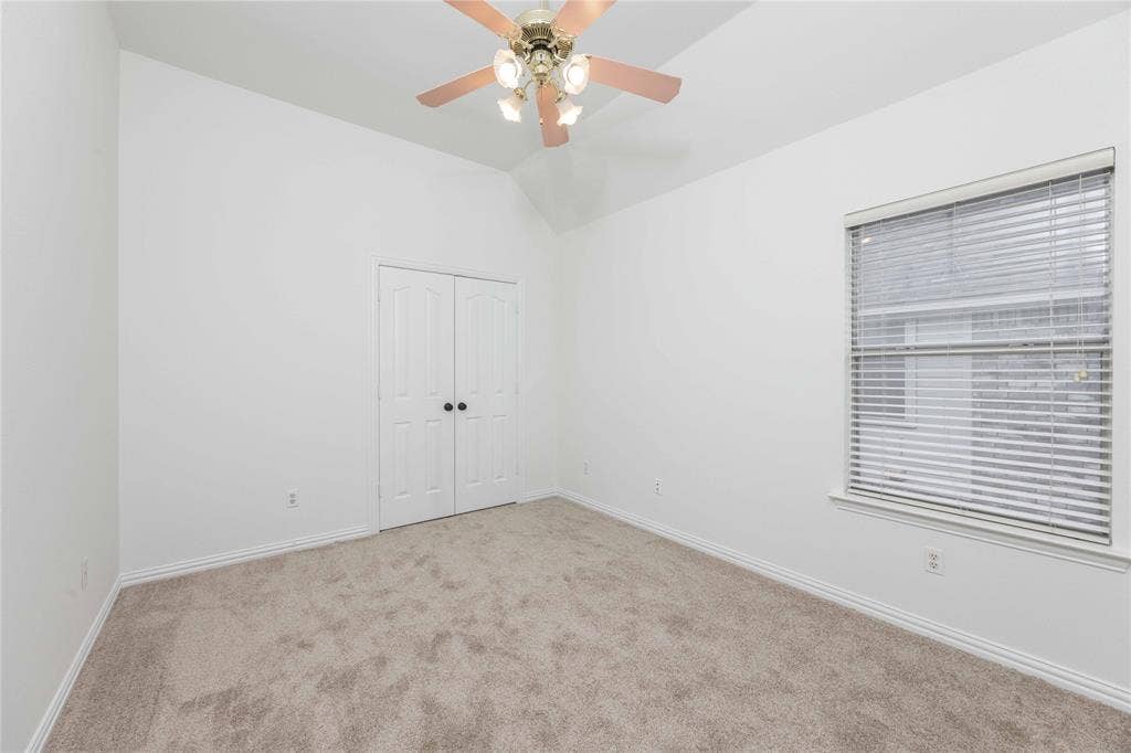 3305 Estacado Lane, Plano, TX 75025 Vaulted ceiling with a ceiling fan