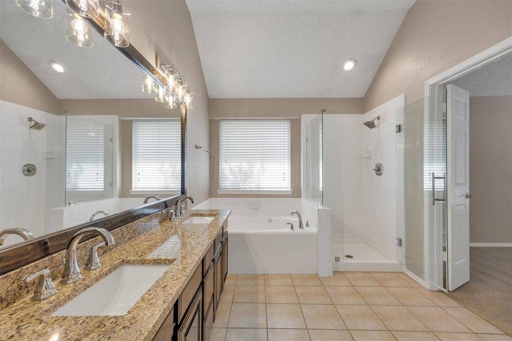 12 Harper Drive, Allen, TX 75002 Large primary bathroom with separate tub and shower.