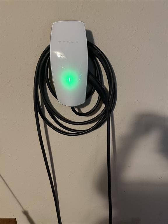 1517 Aylesbury Lane, Plano, TX 75075 Wall-mounted EV charging station with integrated cord management