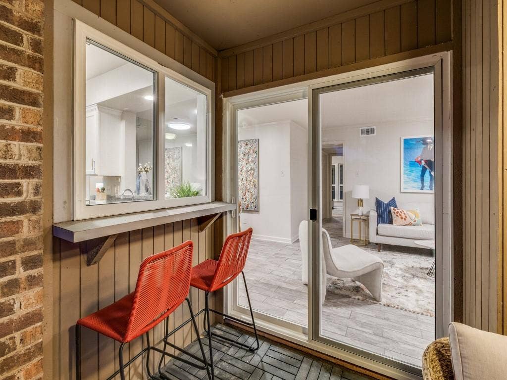 5140 Amesbury Drive, #212, Dallas, TX 75206 Serving window and bar to kitchen area