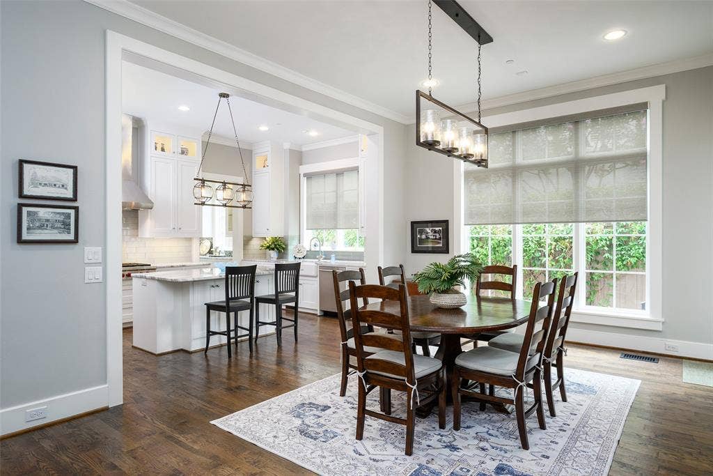 3420 Hanover Street, University Park, TX 75225 Expansive dining area with hardwood flooring and large windows