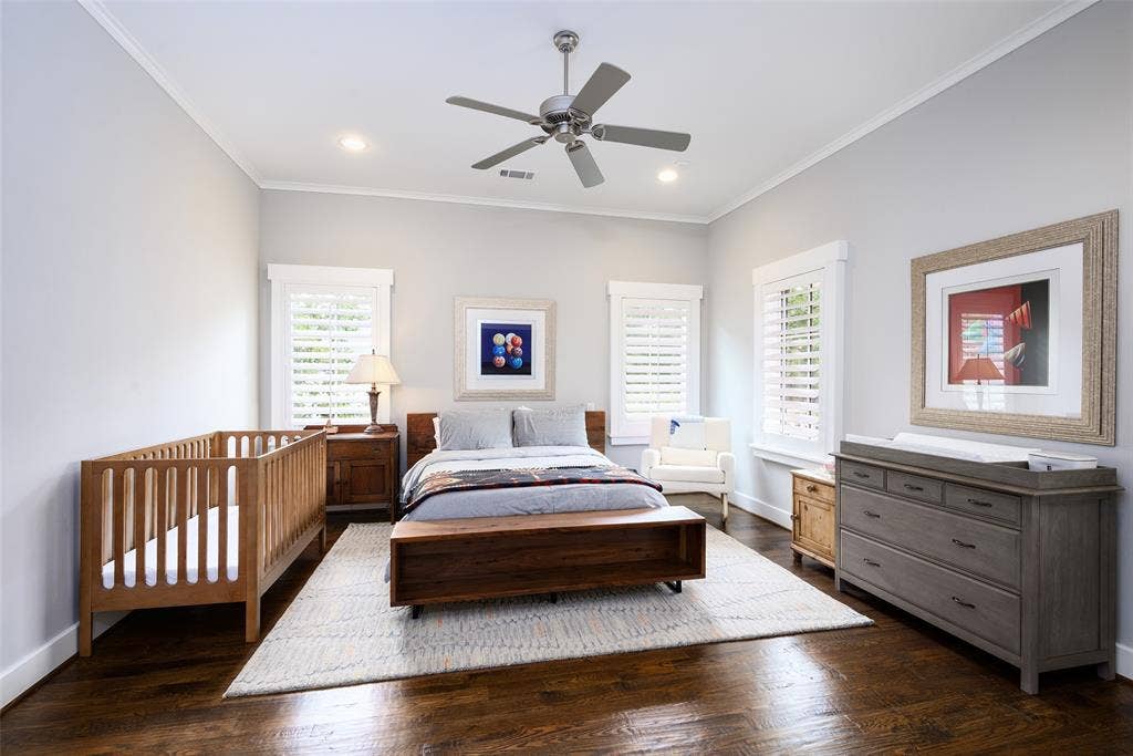 3420 Hanover Street, University Park, TX 75225 Recessed lighting and ceiling fan complement the bright interior with rich, dark wood flooring