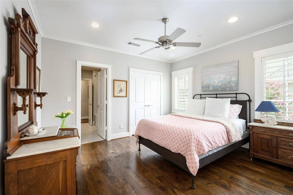 3420 Hanover Street, University Park, TX 75225 Hardwood flooring, crown molding, plantation shutters, ceiling fan with integrated lighting, and recessed lighting