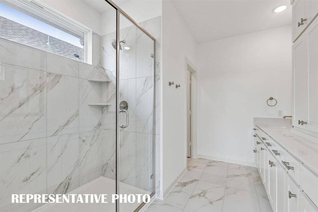 3601 Shepherd Way, McKinney, TX 75071 Featuring an oversized walk in shower, this dream owner's bath is waiting for you to call it your own! REPRESENTATIVE PHOTO