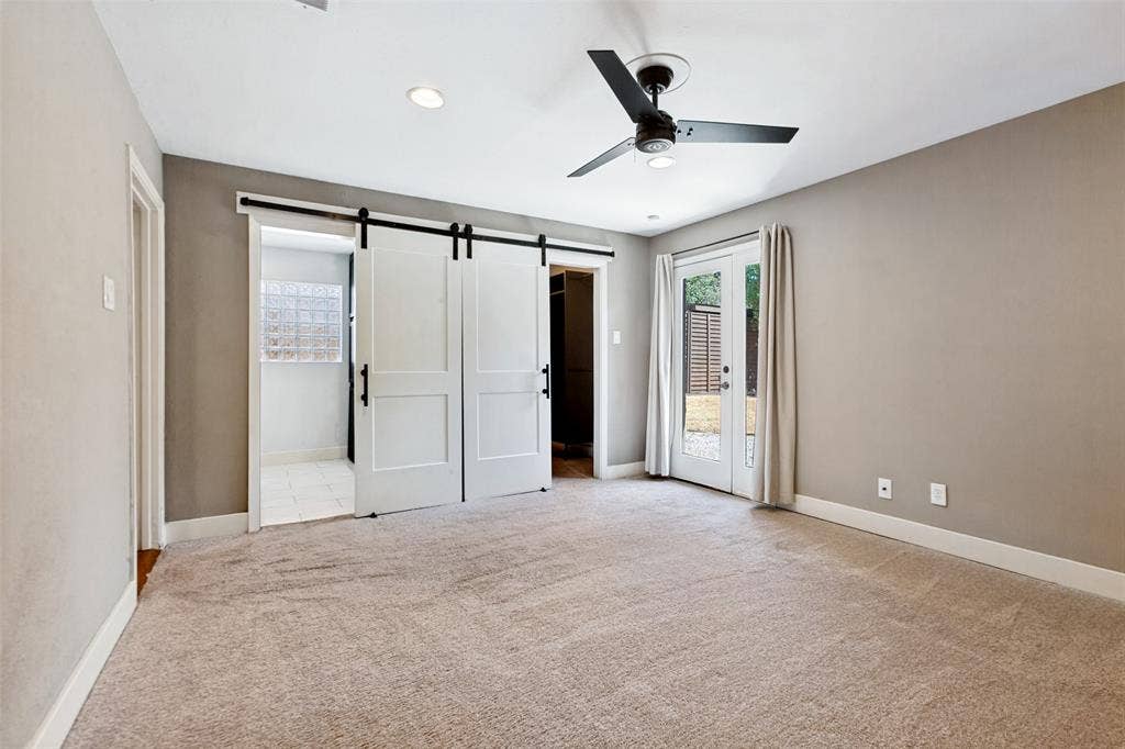 2937 Forest Hills Lane, Richardson, TX 75080 Neutral-toned carpeting throughout, complemented by a contemporary ceiling fan