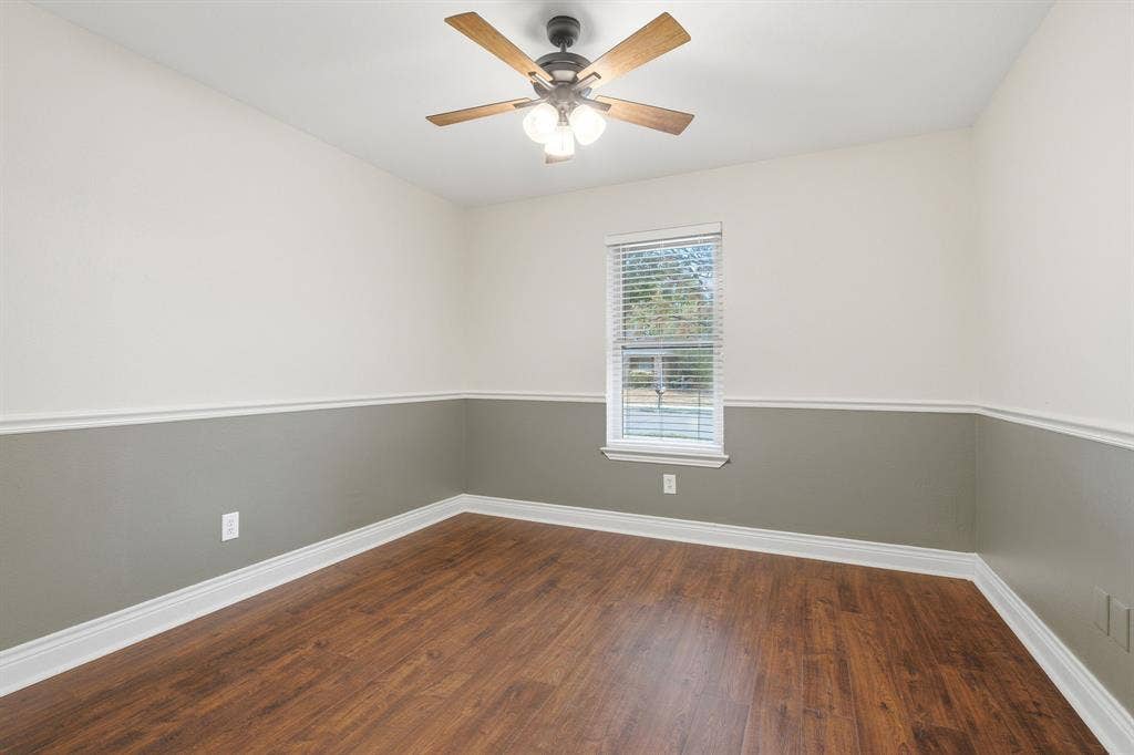 1309 Marigold Drive, Allen, TX 75002 Secondary bedroom with ceiling fan and closet.
