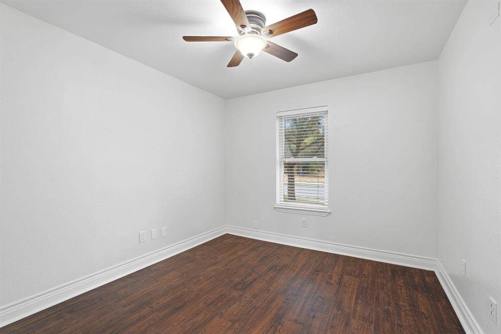 1309 Marigold Drive, Allen, TX 75002 Secondary bedroom with ceiling fan and closet.