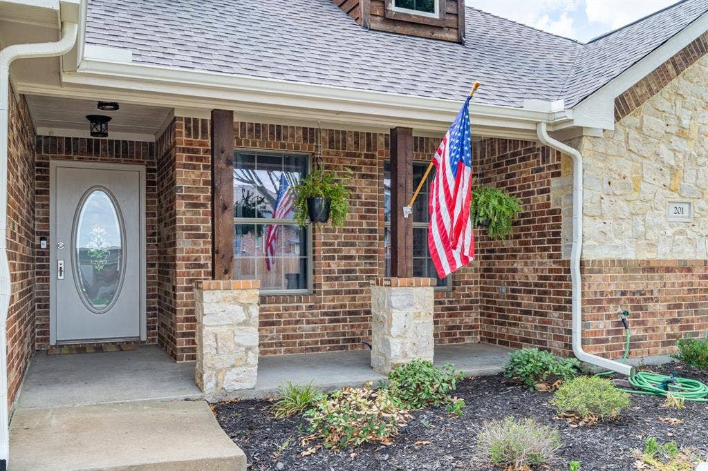 201 Midnight Drive, Royse City, TX 75189 Front patio to enter into your own little haven.