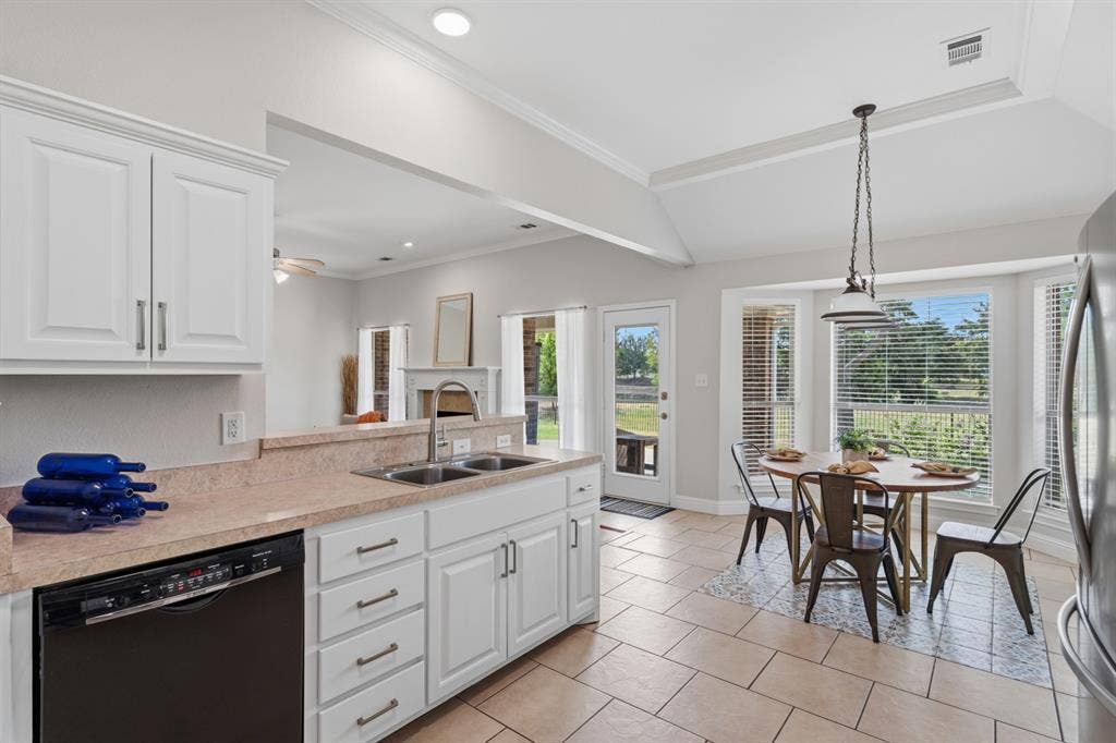 201 Midnight Drive, Royse City, TX 75189 Fully open living-dining-kitchen area. Perfect for mingling with friends.