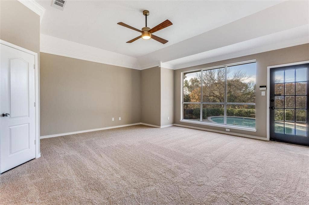2822 Roundrock, McKinney, TX 75072 Spacious primary suite is overlooking the golf course and pool, with private door to backyard.