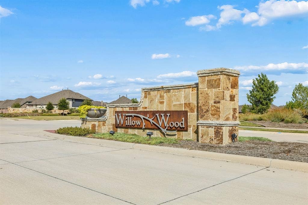 5224 Troupe Road, McKinney, TX 75071 Stone monument sign with integrated landscaping and exterior lighting