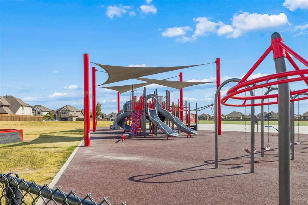 5224 Troupe Road, McKinney, TX 75071 Community playground featuring a multi-level play structure, slides, swings, and shade sails