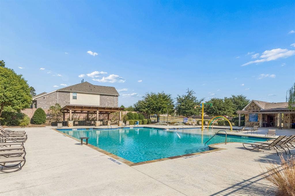 5224 Troupe Road, McKinney, TX 75071 Expansive community pool with integrated splash pad and shallow entry