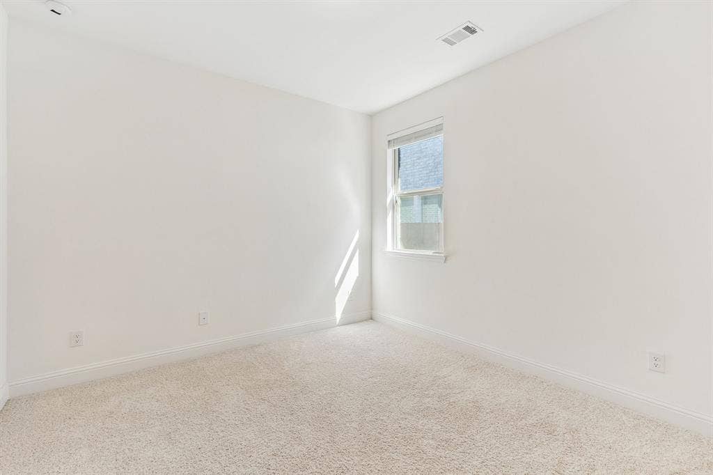 5224 Troupe Road, McKinney, TX 75071 Neutral wall finishes, light-toned carpeting, and a double-hung window