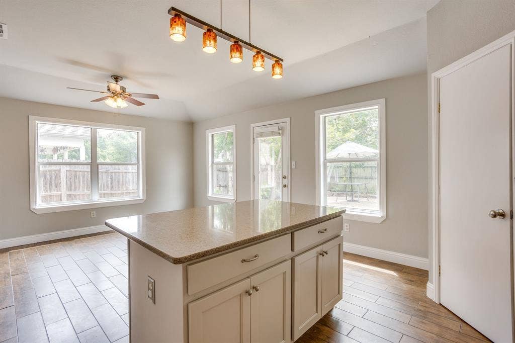 9825 Stoney Bridge Road, Fort Worth, TX 76108 Island overlooking dining area