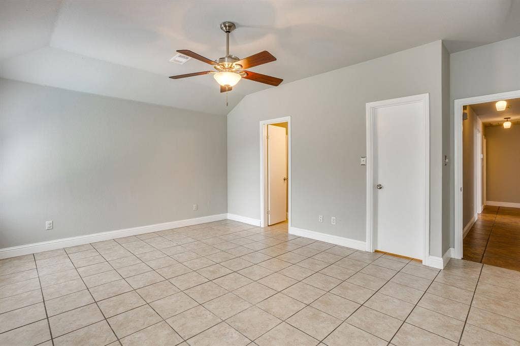9825 Stoney Bridge Road, Fort Worth, TX 76108 Primary bedroom with walk-in closet and ensuite bathroom