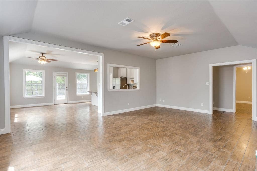 9825 Stoney Bridge Road, Fort Worth, TX 76108 View of living room looking into the dining & kitchen.