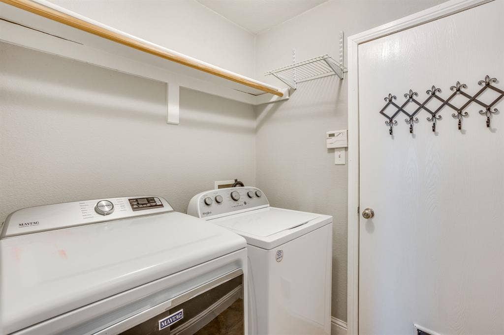 9825 Stoney Bridge Road, Fort Worth, TX 76108 Full size washer and dryer in laundry room off garage
